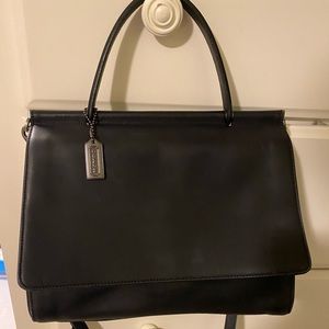 Black leather, clean and lightly used but has some scratches as shown.